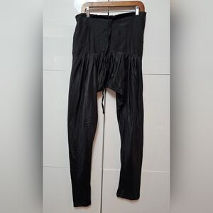 Black churidar-style pants and a dupatta